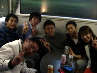 納会（行きの電車）